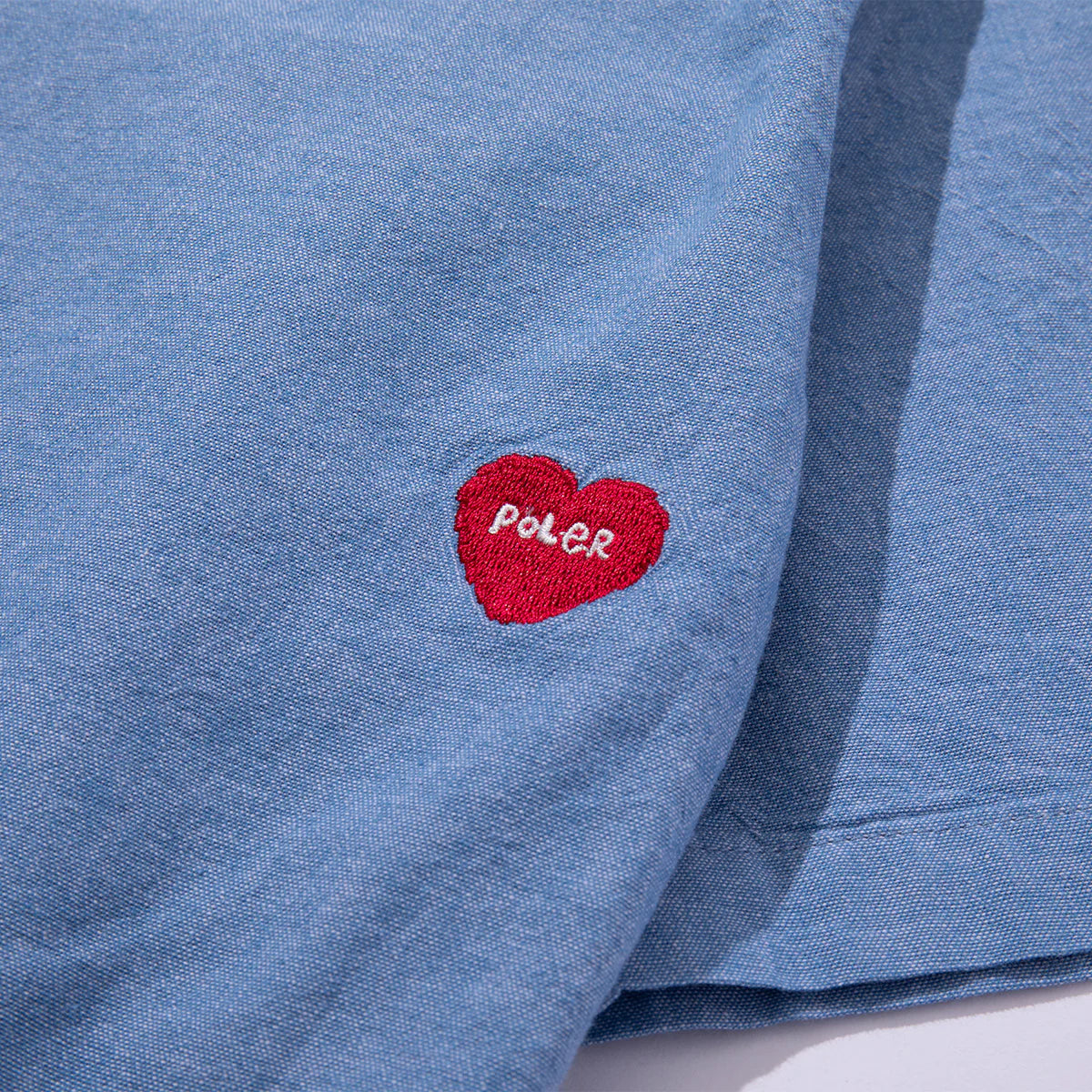 EMB POCKET CHAMBRAY S/S - SAX
